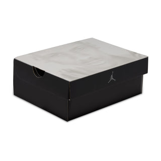 Kids' black shoe box with Jumpman logo on lid and gray top stripe