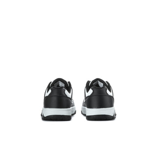 Kids' black-and-white low-top sneakers heel view with white midsole and star branding