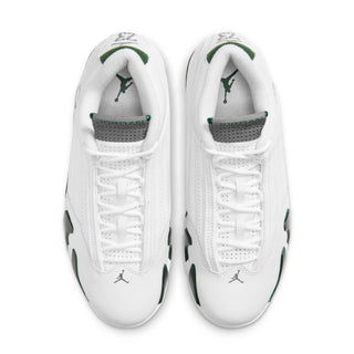 White sneakers with green-lined tongue and laces; rear view with branding