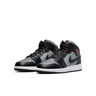 Youth mid-top sneakers, black and gray upper with white midsole and red logo detail