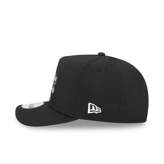 Black baseball cap with New Era flag logo on side and Raiders side mark