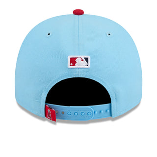 Light blue A-frame baseball cap with back logo patch and adjustable strap