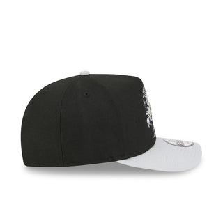 Black baseball cap with white brim and small side embroidery