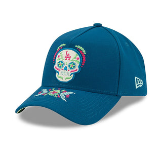 Blue A-frame cap with front skull patch and New Era side flag