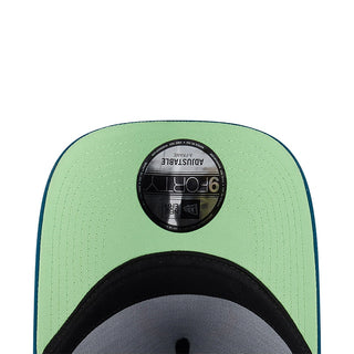 Mint green A-frame cap with black back brand patch and adjustable strap