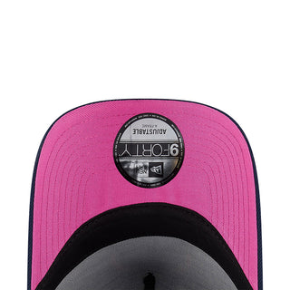 Pink A-Frame baseball cap crown with black circular 9FORTY New Era patch