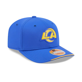 Blue NFL sideline cap, side profile with LA Rams logo and yellow-stitched brim