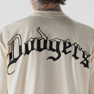 Beige T-shirt back close-up: oversized 'Dodgers' lettering