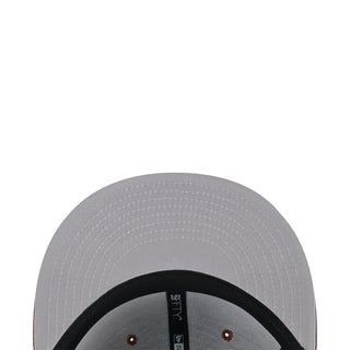 Gray baseball cap close-up of crown with ventilation eyelets and black inner band
