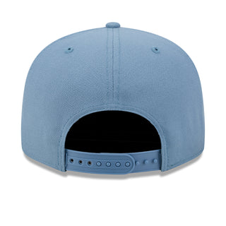 Faded blue baseball cap back view with adjustable strap