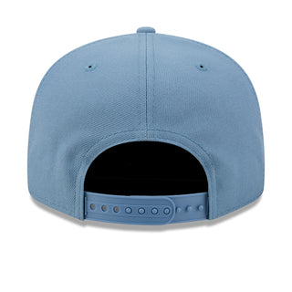 Faded blue baseball cap with open back view and adjustable snap strap