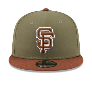 Two-tone baseball cap in olive green with auburn brim and front Giants logo patch
