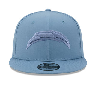 Light blue baseball cap with embroidered arch logo on front panel