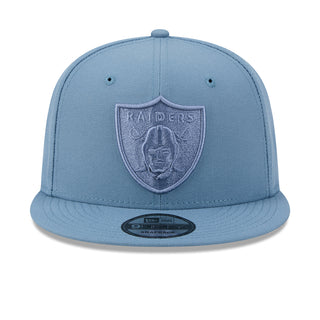 Faded blue Raiders baseball cap with raised shield logo and curved brim