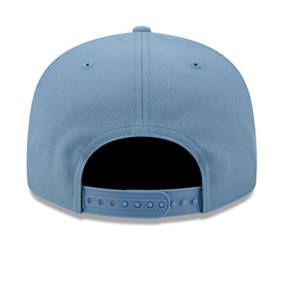 Faded blue Raiders cap back view with adjustable strap and vent holes