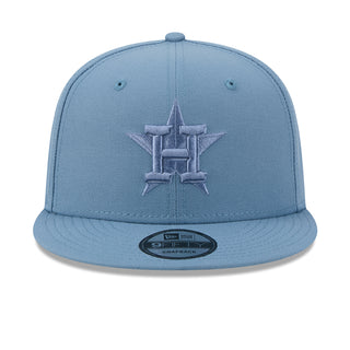 Faded blue baseball cap with front logo embroidery and curved brim