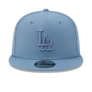 Faded blue snapback baseball cap with raised LA Dodgers logo on front