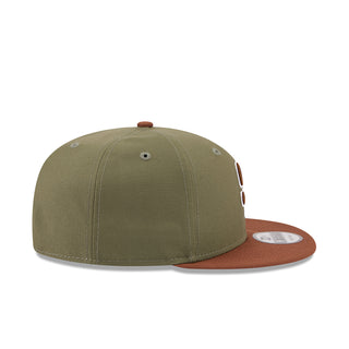 Two-tone baseball cap, olive crown with brown brim and embroidered Padres side logo