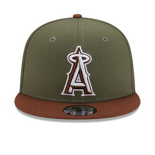 Olive baseball cap with brown brim and white-and-brown A embroidered patch