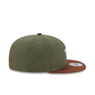 Two-tone olive baseball cap with brown underbrim and side logo