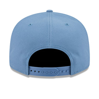 Faded blue baseball cap back view with snap closure panel