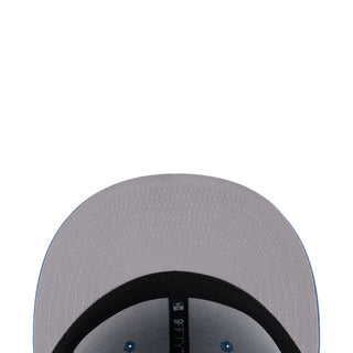 Gray baseball cap close-up with black inner band and stitched fabric texture