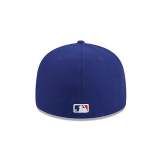 Blue baseball cap with New Era logo patch on back center.