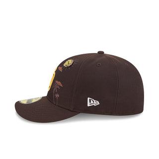 Brown baseball cap with sunburst patch, palm tree embroidery, and New Era flag side.