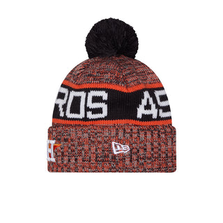 Orange knit beanie with black pom, large Astros letter patch on front