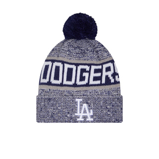 Blue knit beanie with navy pom, ribbed cuff, Dodgers-style lettering and LA logo.