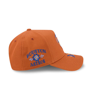 Rust baseball cap with multicolored team text and star graphic on side