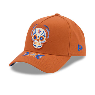 Rust A-Frame baseball cap with sugar skull patch and small blue flag logo