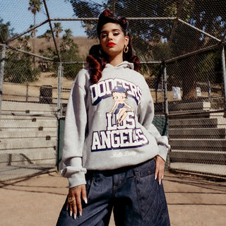Heather grey unisex hoodie on model with front Dodgers Los Angeles graphic, hooded