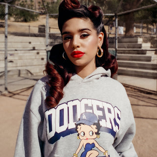 Heather grey hoodie close-up with Dodgers Los Angeles cartoon graphic on chest