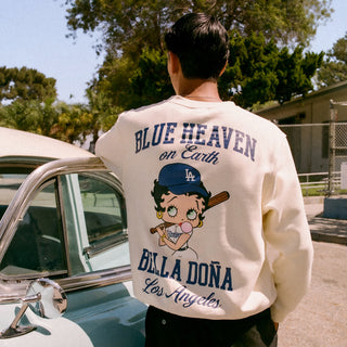 Unisex cream crewneck sweatshirt back: 'BLUE HEAVEN on Earth' with character art