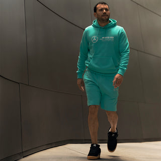 Men's teal hooded set shorts with PUMA logo on the leg