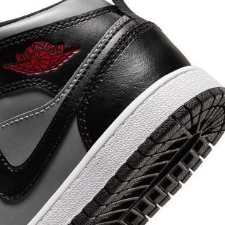 Kids black leather high-top with red Air logo, black swoosh, stitched detail