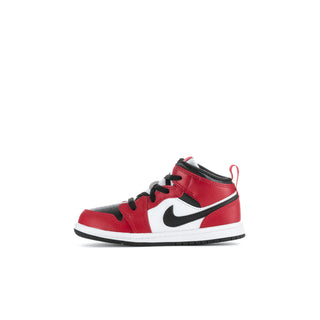 Toddler mid-top sneakers side view with red upper, white midsole, and black swoosh