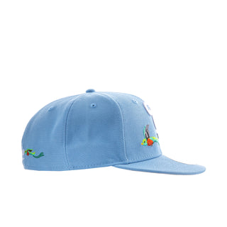 Light blue baseball cap with side bird-and-flower embroidery and curved brim