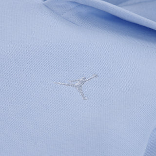 Light blue fleece fabric close-up with embroidered Jumpman logo