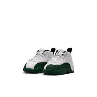 Toddler high-top sneaker pair in white with green side panels, lace-up design