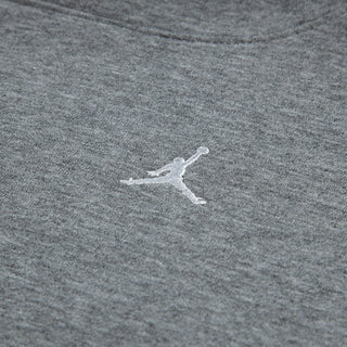 Carbon heather fleece fabric with small white Jordan jumpman logo on pants