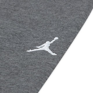 Carbon heather fleece jogger leg with white Jordan Jumpman logo