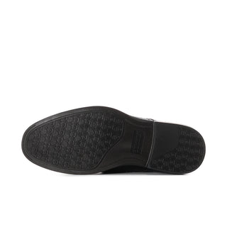 Men's black leather loafer outsole with textured tread and embossed mark