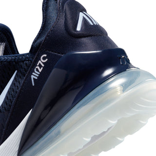 Youth sneaker side close-up: dark navy strap with Air window and white Swoosh