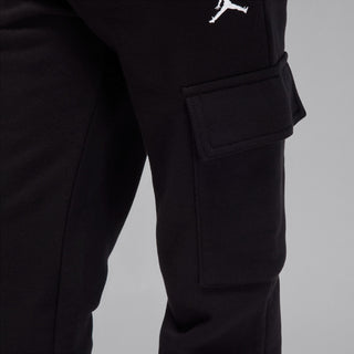 Youth black fleece cargo pants close-up of right cargo pocket