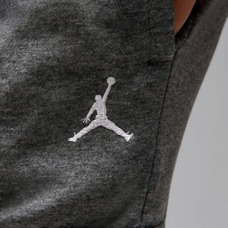 Carbon heather youth fleece cargo pants with white Jordan logo near side pocket