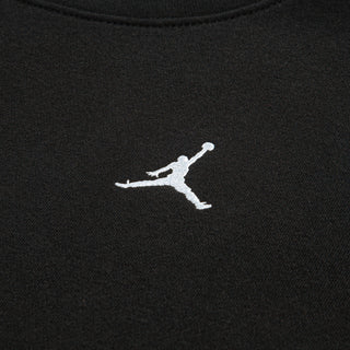 Black crewneck sweatshirt close-up of white Jumpman basketball logo