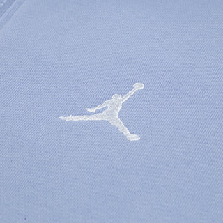 Light blue fleece hoodie with white Jordan jumpman logo on the chest