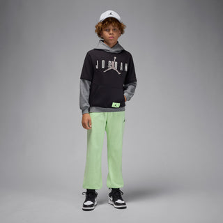Youth black fleece pullover hoodie with gray sleeves and Jumpman graphic, front pocket